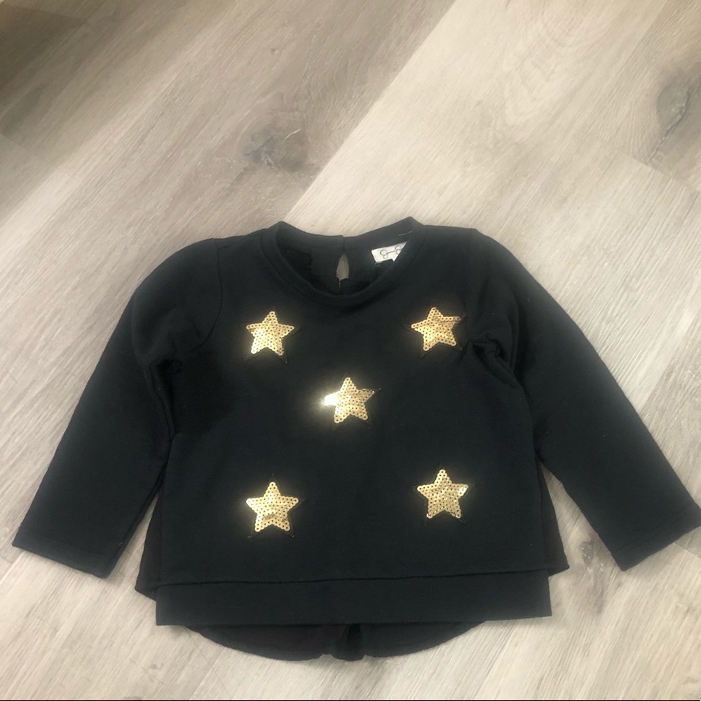 Jessica Simpson star sweater